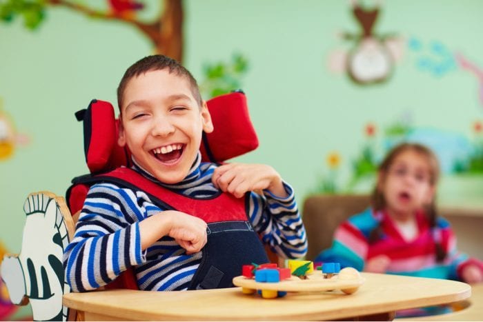 child with cerebral palsy laughing
