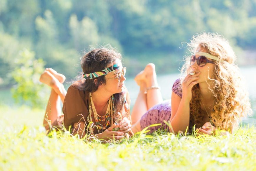 hippie girls smoking a joint, like at woodstock