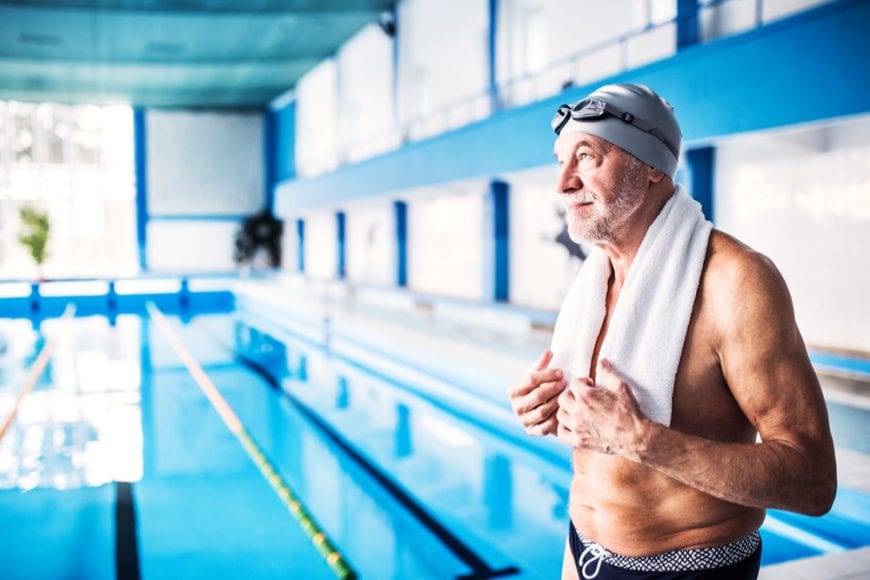 Senior man at a swimming pool