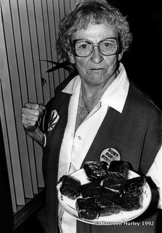 Brownie Mary posing with brownies