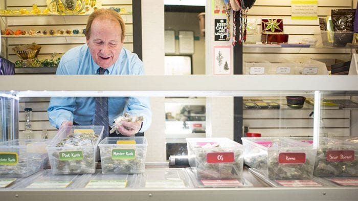 police raid dispensaries man setting up edibles